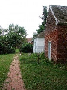 The Out Buildings - smoke house and dairy/wash house.